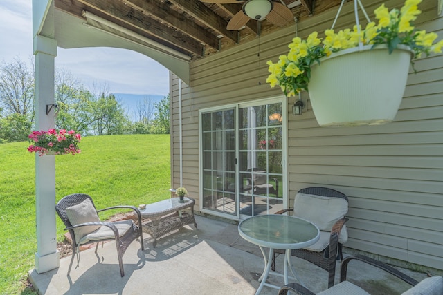 view of patio with a ceiling fan