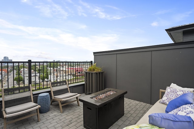 view of patio featuring an outdoor fire pit