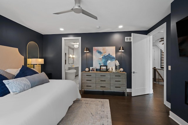 bedroom featuring visible vents, baseboards, ensuite bathroom, dark wood-style floors, and recessed lighting