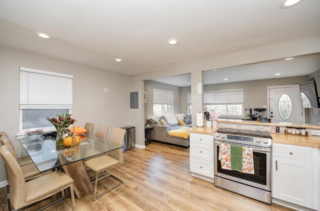 621 Edgecliff Rd, Covington, KY 41014 - kitchen with light wood-style floors, electric stove, white cabinetry, and recessed lighting