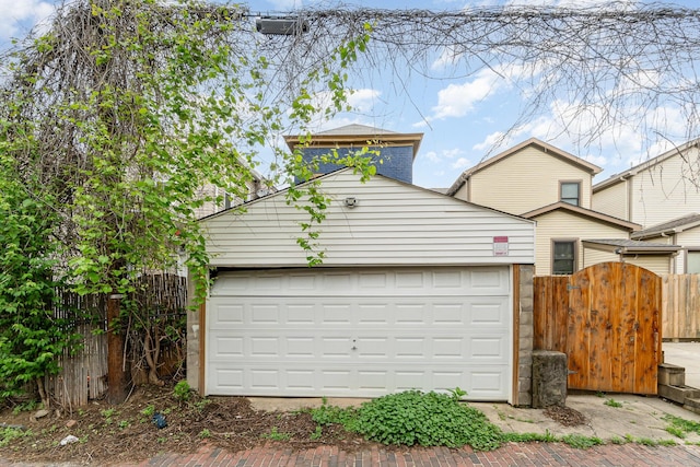 910 Hamlet St, Newport, KY 41071 - garage featuring fence and a gate