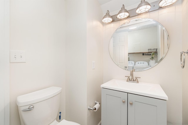 2810 Dry Ridge Ct, Villa Hills, KY 41017 - bathroom with vanity, washing machine and dryer, and toilet