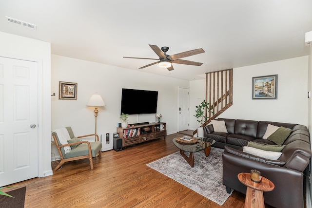 2810 Dry Ridge Ct, Villa Hills, KY 41017 - living room with a ceiling fan, visible vents, wood finished floors, stairway, and baseboards
