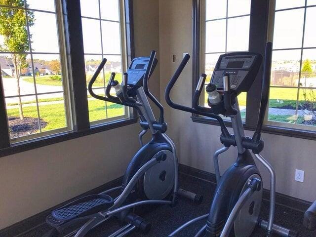 exercise room with plenty of natural light