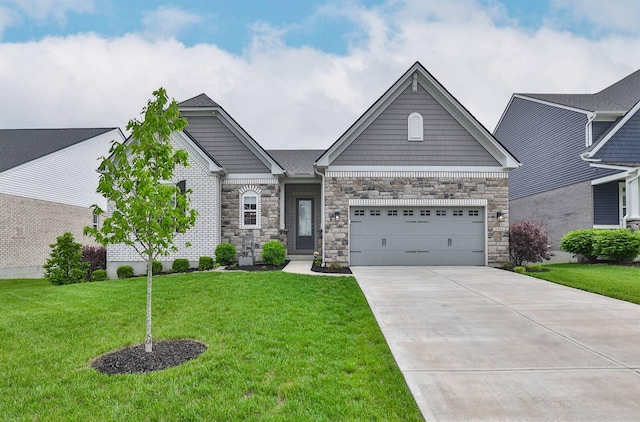 craftsman house featuring a garage, driveway, stone siding, and a front lawn