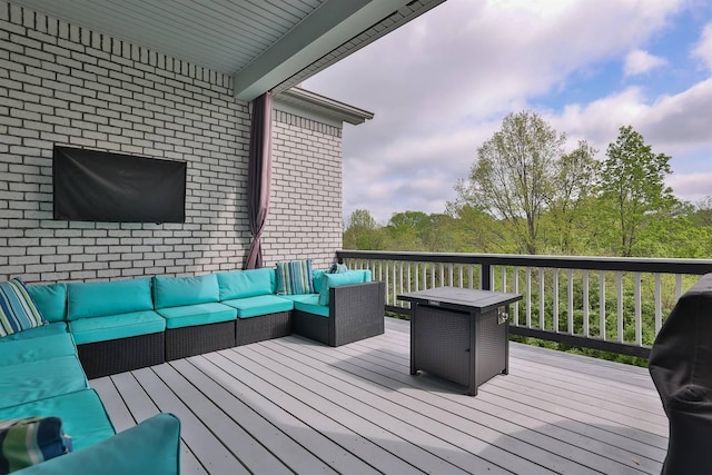 deck featuring an outdoor living space