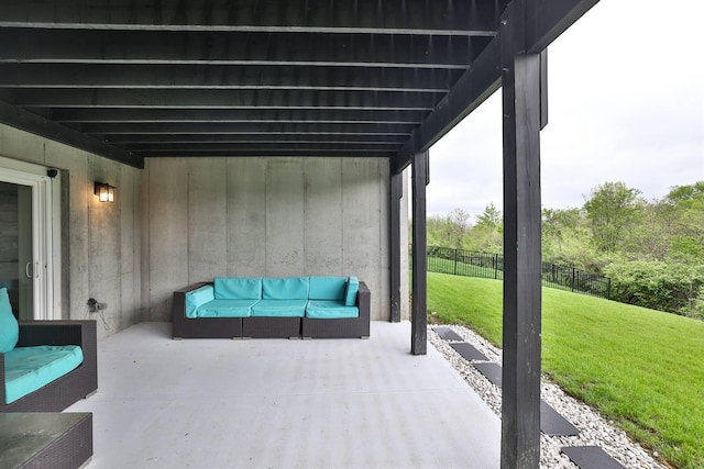 view of patio with fence and outdoor lounge area