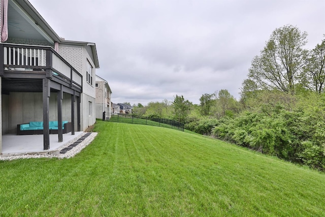 view of yard with fence and a patio area