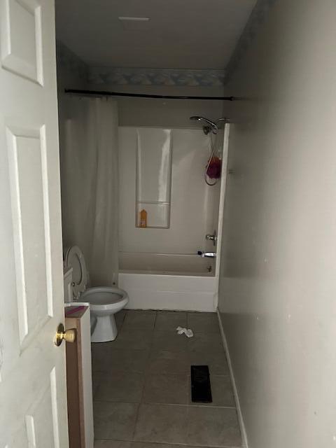 407 E E Shelby St, Falmouth, KY 41040 - full bath with tile patterned flooring, vanity, toilet, shower / bath combination, and baseboards