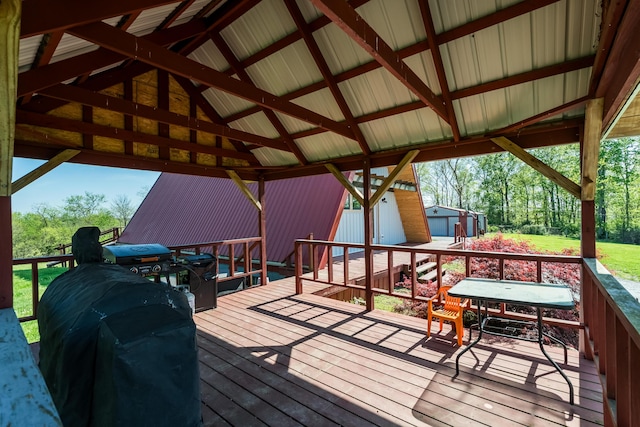 wooden deck featuring an outdoor structure