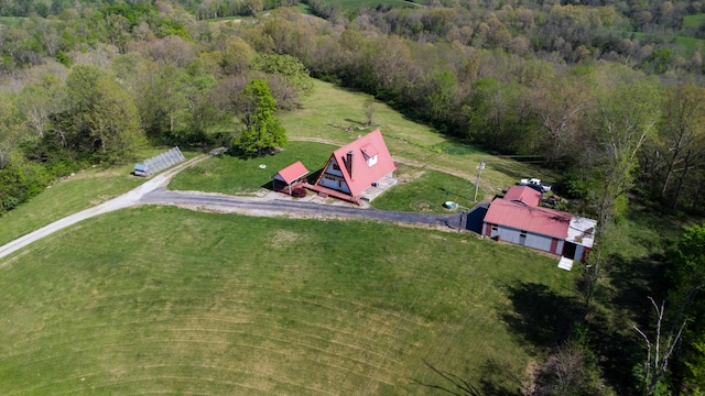 aerial overview of property's location featuring a forest