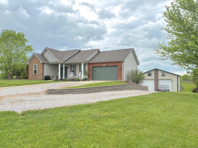 single story home featuring brick siding, roof with shingles, and a front yard