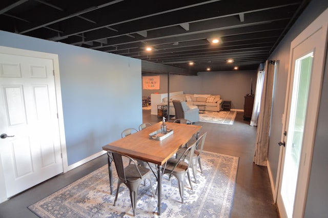 dining area featuring baseboards