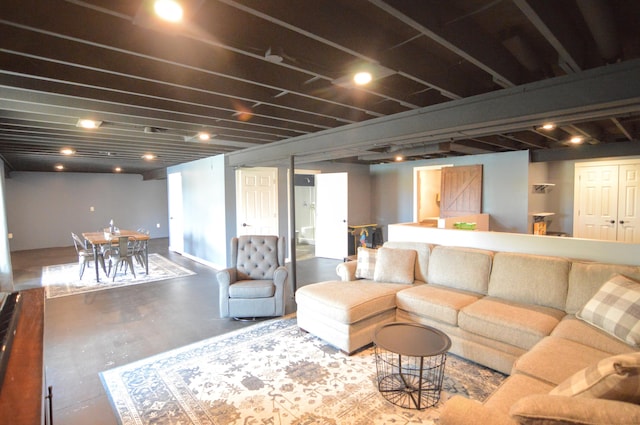 living room with finished concrete flooring