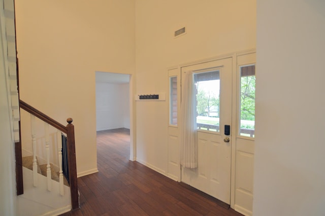 1376 Symbo Ln, Walton, KY 41094 - entryway with visible vents, a towering ceiling, baseboards, dark wood-style floors, and stairway
