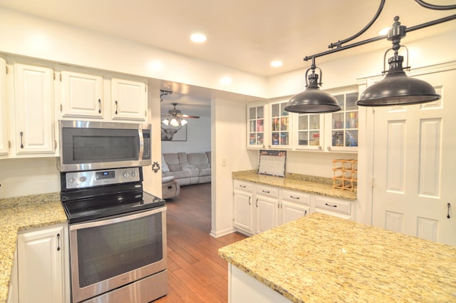 1376 Symbo Ln, Walton, KY 41094 - kitchen featuring stainless steel appliances, white cabinetry, wood finished floors, and glass insert cabinets