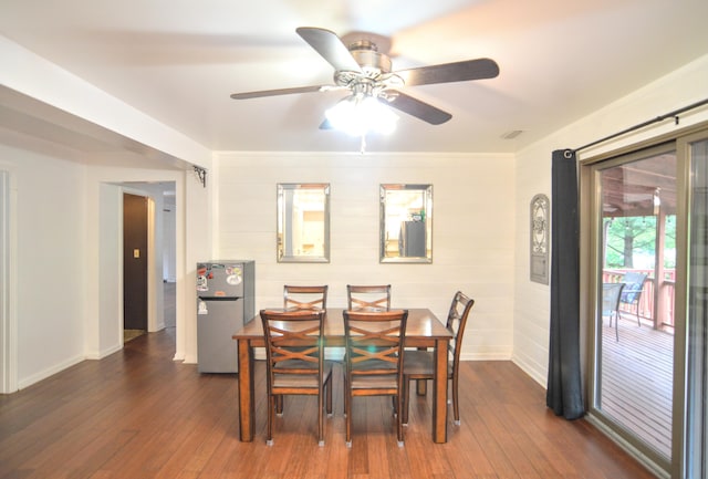 1376 Symbo Ln, Walton, KY 41094 - dining area featuring a ceiling fan, baseboards, visible vents, and dark wood-style floors