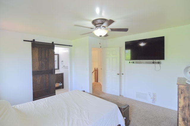 1376 Symbo Ln, Walton, KY 41094 - carpeted bedroom featuring visible vents, baseboards, ceiling fan, a barn door, and connected bathroom