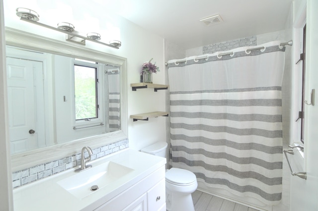 1376 Symbo Ln, Walton, KY 41094 - full bathroom with toilet, visible vents, curtained shower, and vanity