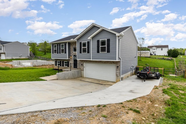 465 Eagle Creek Dr, Dry Ridge, KY 41035 - bi-level home with fence, driveway, a front yard, and a garage