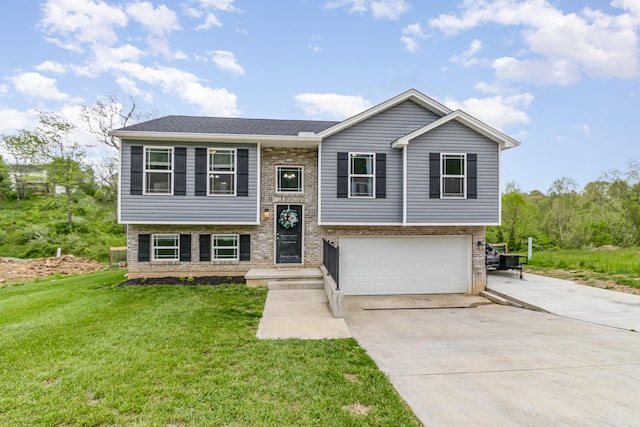 465 Eagle Creek Dr, Dry Ridge, KY 41035 - split foyer home with an attached garage, a front lawn, driveway, and brick siding