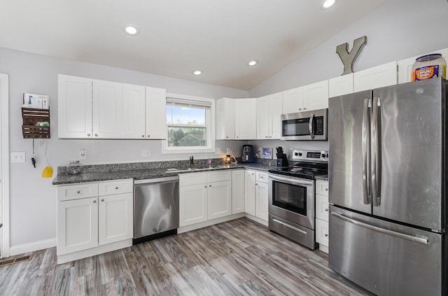 465 Eagle Creek Dr, Dry Ridge, KY 41035 - kitchen featuring a sink, white cabinets, light wood-style floors, and stainless steel appliances
