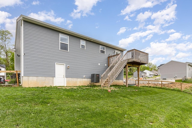 465 Eagle Creek Dr, Dry Ridge, KY 41035 - rear view of house with a wooden deck, central AC, fence, a yard, and stairs