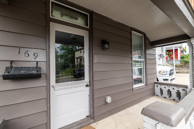 property entrance with a porch