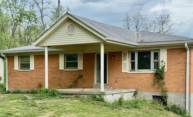 3390 Rector Rd, Morning View, KY 41063 - single story home with a porch, brick siding, roof with shingles, and a front lawn