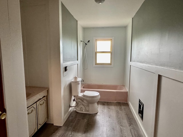 3390 Rector Rd, Morning View, KY 41063 - bathroom with vanity, washtub / shower combination, wood finished floors, and toilet