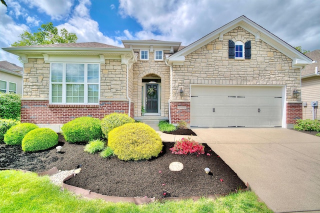 3909 Parkplace Dr, Erlanger, KY 41018 - view of front of home featuring stone siding, concrete driveway, and a garage