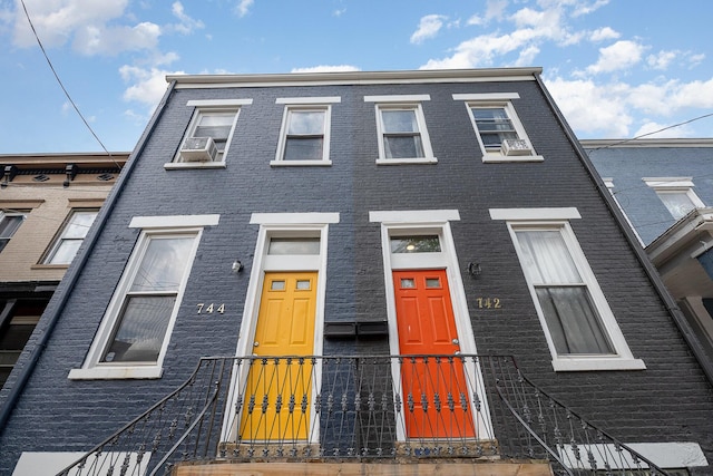 multi unit property featuring brick siding