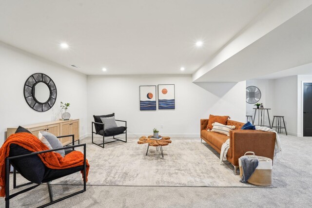 living area with carpet, recessed lighting, and baseboards