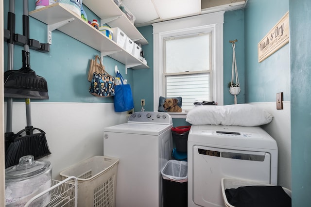 laundry room with separate washer and dryer and laundry area