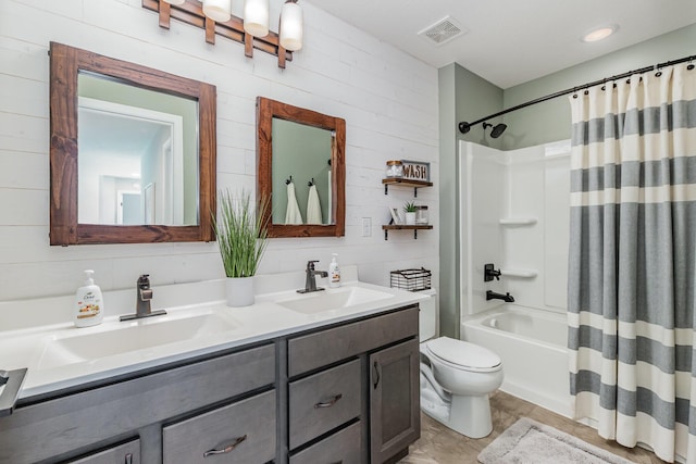 bathroom with toilet, shower / tub combo with curtain, double vanity, and wood walls