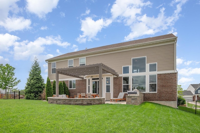 rear view of property with a pergola, a patio, and brick siding