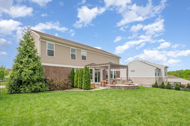 back of house featuring a pergola, a patio, and brick siding