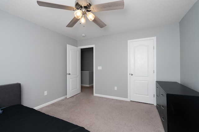 12062 Ambruzzi Dr, Walton, KY 41094 - unfurnished bedroom with light carpet, baseboards, and ceiling fan