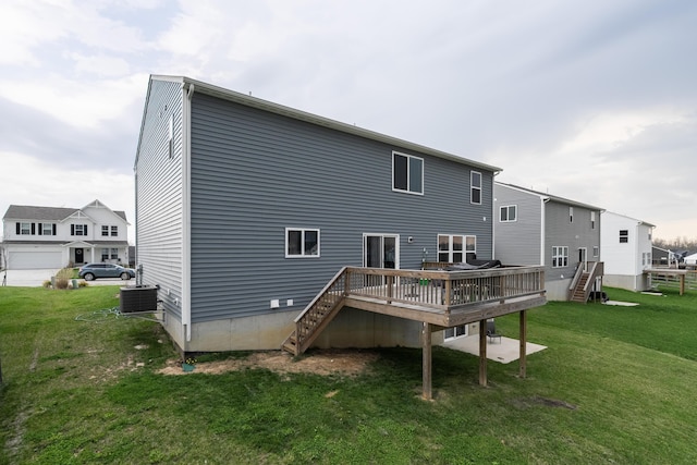 12062 Ambruzzi Dr, Walton, KY 41094 - back of house with central AC unit, a wooden deck, a yard, and stairs