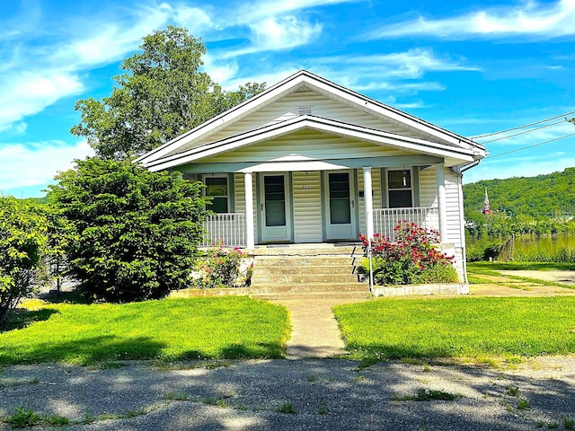330 Pike St, Bromley, KY 41016 - view of front of house with covered porch and a front lawn