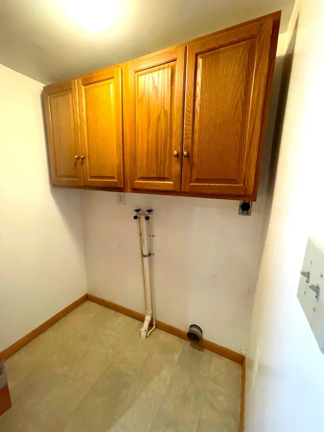 330 Pike St, Bromley, KY 41016 - laundry area with cabinet space, hookup for a washing machine, and electric dryer hookup