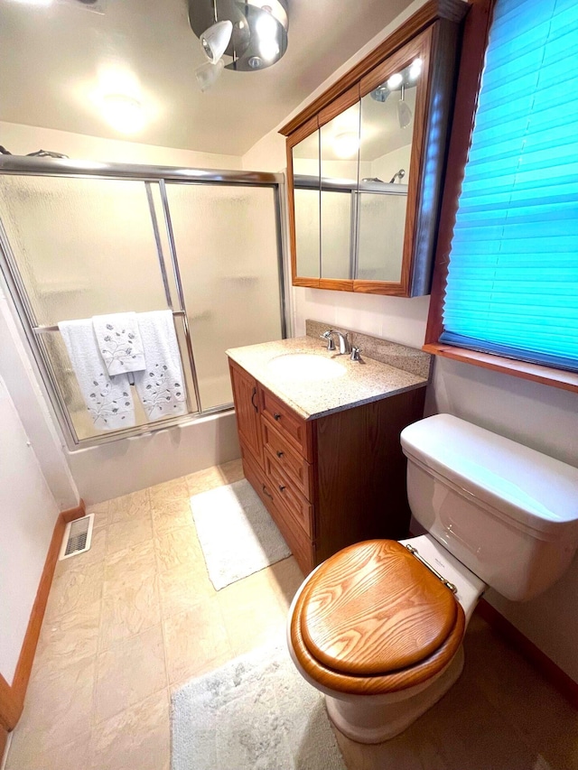 330 Pike St, Bromley, KY 41016 - full bathroom with vanity, enclosed tub / shower combo, and tile patterned floors