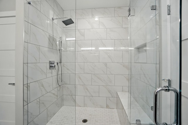 bathroom with a stall shower