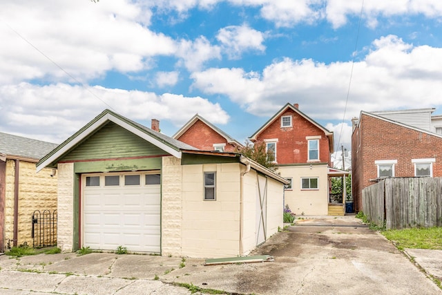 garage with fence