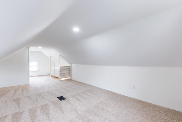 bonus room with recessed lighting, visible vents, carpet floors, and vaulted ceiling