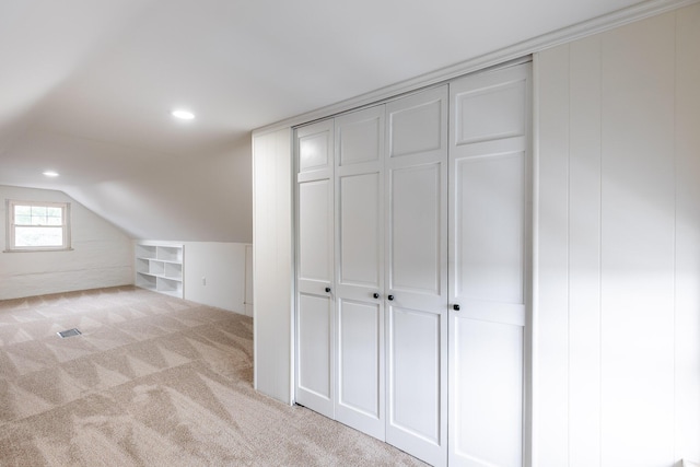 bonus room with lofted ceiling, carpet flooring, recessed lighting, and built in features