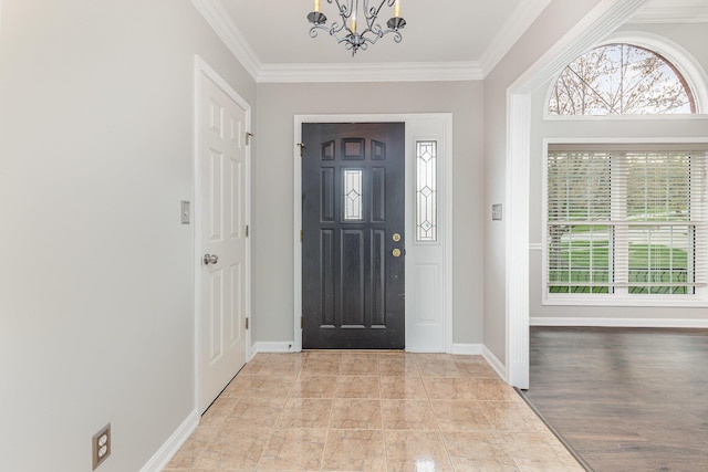 2600 Sunningdale Pl E, La Grange, KY 40031 - foyer entrance with a chandelier, ornamental molding, plenty of natural light, and baseboards