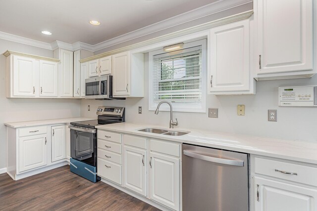 2600 Sunningdale Pl E, La Grange, KY 40031 - kitchen with appliances with stainless steel finishes, a sink, ornamental molding, dark wood finished floors, and white cabinetry