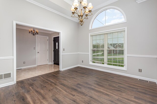 2600 Sunningdale Pl E, La Grange, KY 40031 - unfurnished room with a chandelier, crown molding, wood finished floors, and baseboards