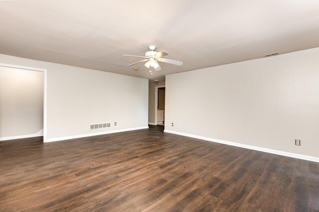 2600 Sunningdale Pl E, La Grange, KY 40031 - unfurnished room with ceiling fan, baseboards, and dark wood-type flooring